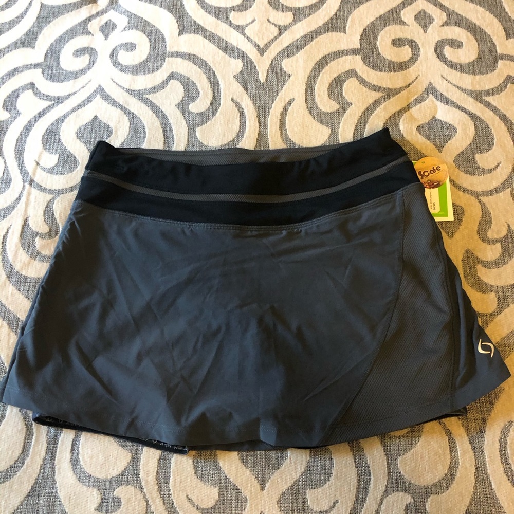 Moving comfort skort, small, grey and black.
